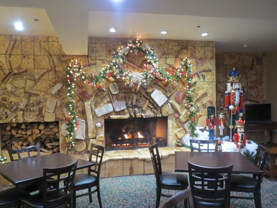 All Seasons Fireplace New Bar area Fire is A Fake Yes even though there are Lots Of