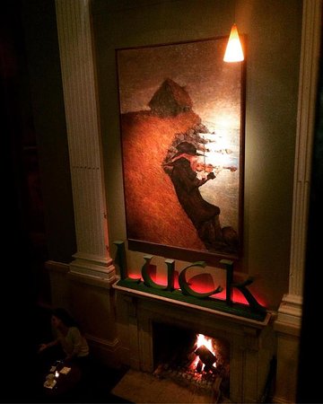 Lovely artwork fireplace Picture of The Plough & The Stars fireplace