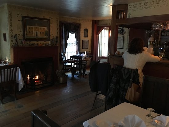 Pub area has real wood burning fireplace limited bar seats pub area has real wood