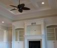 Beach Fireplace Elegant Ceiling Coffer and Fireplace Wall with Built Ins
