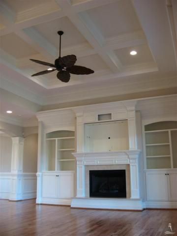 Beach Fireplace Elegant Ceiling Coffer and Fireplace Wall with Built Ins