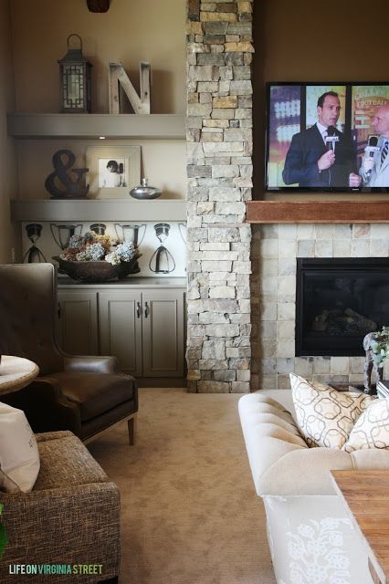 Built in around the fireplace love the gray cabinets 390d2c58faa9c03da2708d4b624f93a2