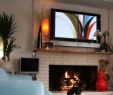 Contemporary Fireplace Designs with Tv Above Inspirational Fireplace W Tv Above and Simple Wooden Shelf Clean Design