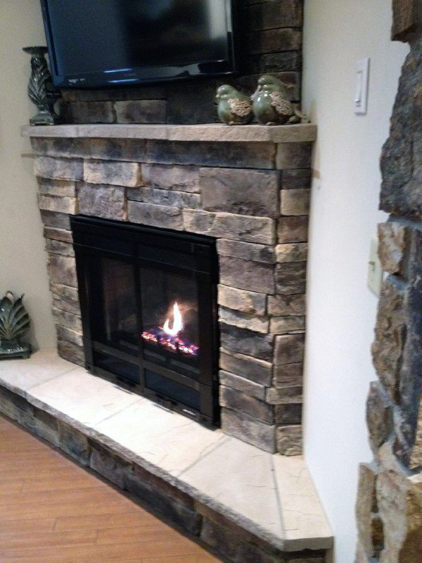 vintage stone corner fireplace design ideas