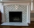 Covering Brick Fireplace with Tile Awesome Moroccan Lattice Tile Fireplace Yes Please