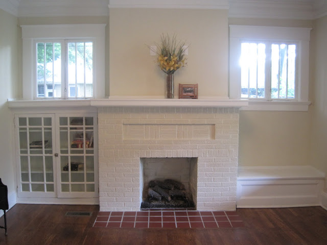 pretty old houses open house sunday virginia highland bungalow the fireplace is very craftsman with high windows and built ins on one side a book case other bench fireplace with windows home decor hom