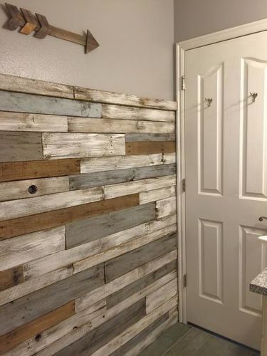 Reclaimed pallet wood creates unique and rustic accent walls 0d4bde2fc1338acee4646ae6c5f718dc