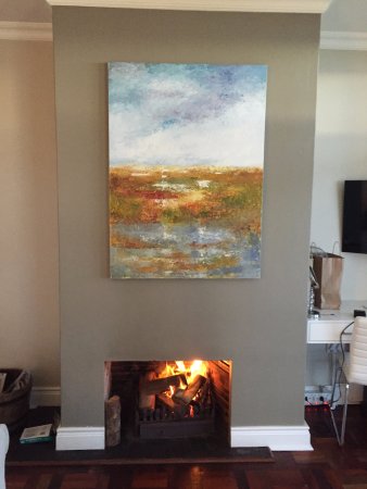 Beautiful art work over the fireplace in the Walker Bay beautiful art work over