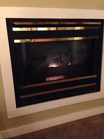 fireplace with tiny flame