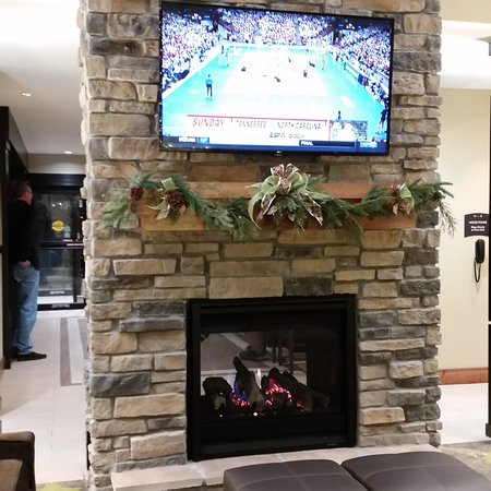 2 way FIREPLACE is beautiful in lobby area Picture of 2 way fireplace is beautiful