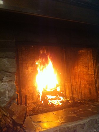 lodge fireplace and blazing