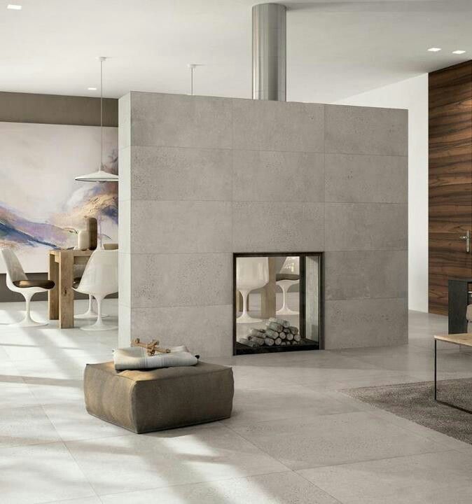 Modern fireplace in the middle of the room da0d7b95d5374c2d39e801e4fd8e714c