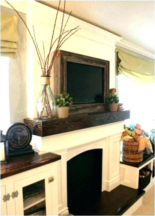 tv on fireplace mantel above mantel wooden frame around mantle mount fireplace tv over fireplace mantel designs