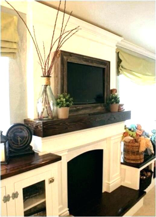 Decorating Fireplace Mantel With Tv Over It Fireplace tv on fireplace mantel above mantel wooden frame around mantle mount fireplace tv over fireplace mantel designs