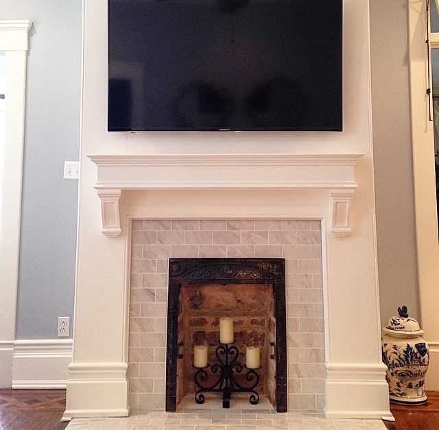 Family Room Custom mantel with marble subway tile and 06bd0d7ff72afc a451cf0991b