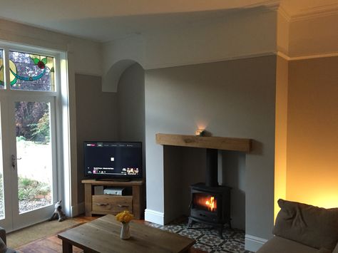Wood burning stove and tiled hearth Brick fireplace has ae250d5179eb267b449e0a3562fbecca dado rail log burner