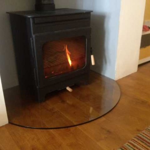 woodburning stove glass hearth 500x500 JPG