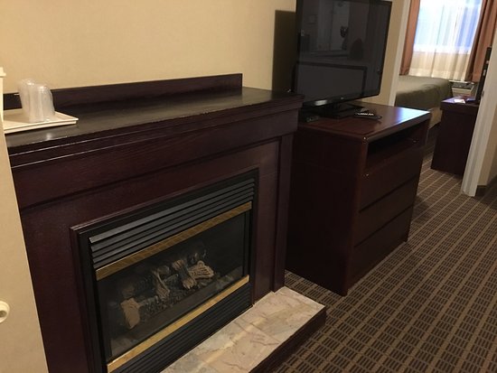 Quality Inn & Suites 1000 Islands fireplace in room quality inn suites 1000