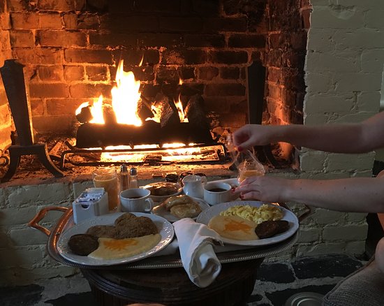Room service in front of our fireplace Picture of The room service in front
