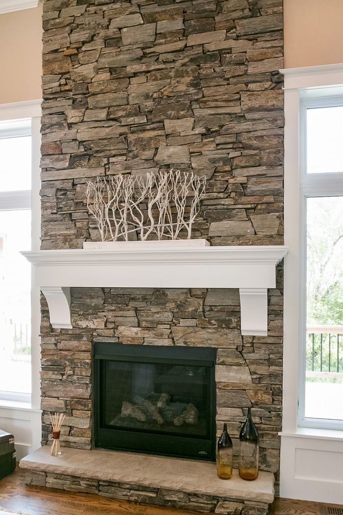 Fireplace Stone Walls Luxury Window to Window Family Room