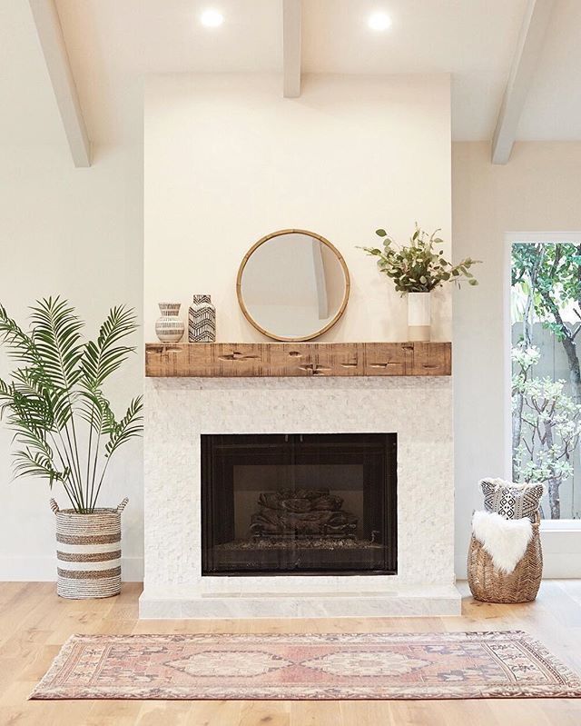 Love the simplicity of this fireplace with the clean white 0d9c845bb6be1979f65d4af9f4f