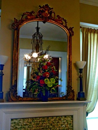 Period mirror above fireplace Picture of Blue Hat Coffee period mirror above fireplace