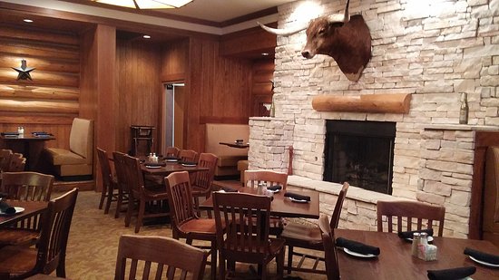 Texas Land & Cattle Steakhouse Garland s fireplace seating