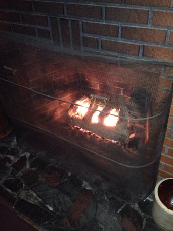 Fireplace adds a nice touch Picture of Smithy Restaurant fireplace adds a nice