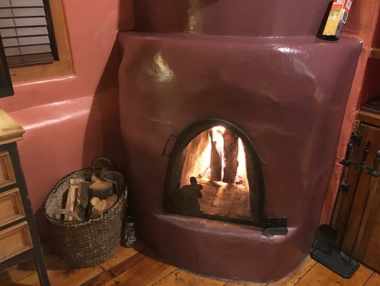 Violeta kiva fireplace w unlimited wood supply Picture of unlimited wood supply