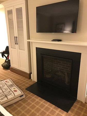 Fireplace in our room was an upgrade Picture of Kimpton fireplace in our room