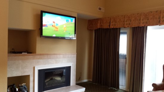 Living room TV and fireplace in 3br unit at Historic living room tv and fireplace