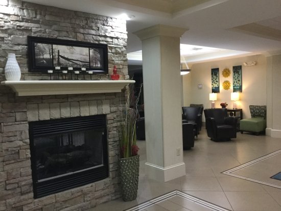 Hotel Room with Fireplace New Nice Fireplace that is Visible On Both Sides Of Lobby