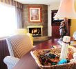 Hotel with Fireplace and Jacuzzi In Room Elegant Jr King Suite with sofa Bed Fireplace and Jacuzzi Picture