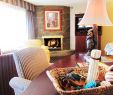 Hotel with Fireplace and Jacuzzi In Room Elegant Jr King Suite with sofa Bed Fireplace and Jacuzzi Picture