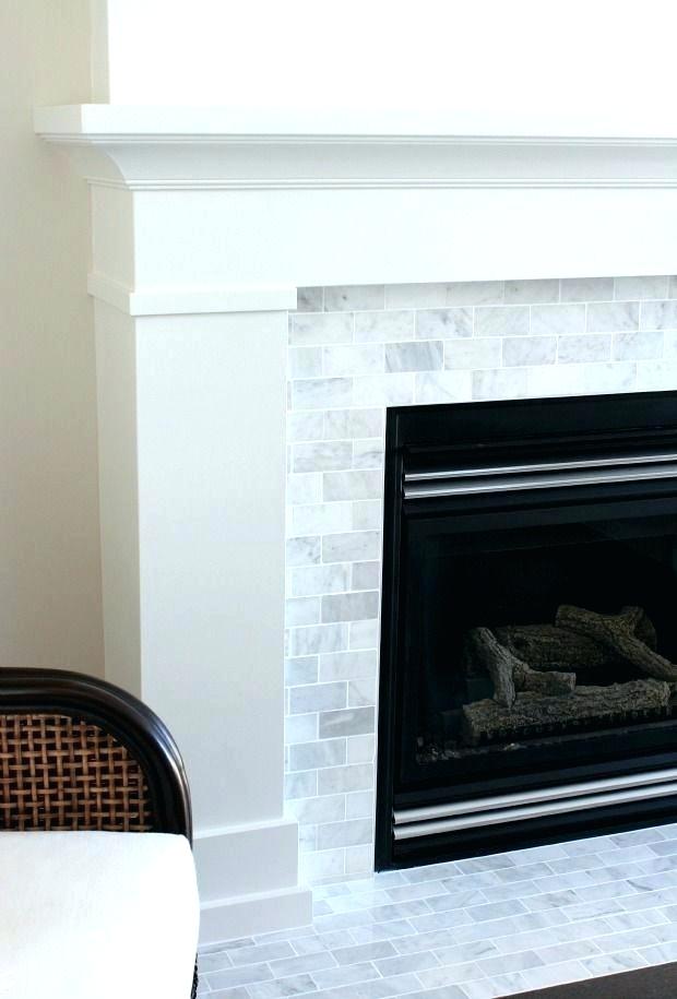 painting tile around fireplace paint fireplace tile plus white painted fireplace with marble subway tile the makeover details for frame painting tile fireplace painting marble tile fireplace