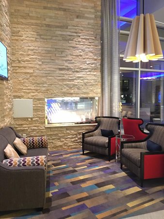 Lobby seating with indoor outdoor fireplace Picture of outdoor fireplace