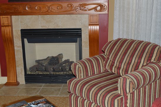 The fireplace and living room is so special Picture of the fireplace and living
