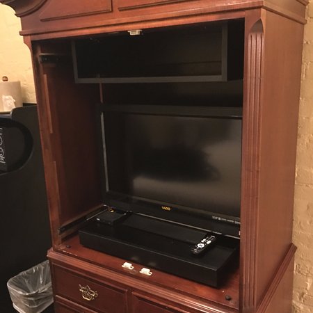 Doors broken and missing from tv cabinet Picture of Hotel doors broken and missing