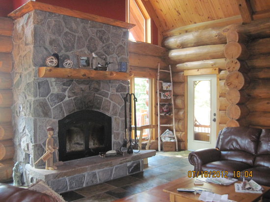 Stone fireplace in 24ft high timber framed ceiling great stone fireplace in 24ft