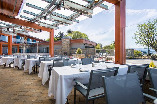 The heated glass enclosed patio and courtyard with heaters patio