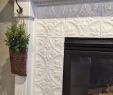 Replacing Tile Around Fireplace Beautiful Fireplace Makeover with Tin Tile Fireplaces