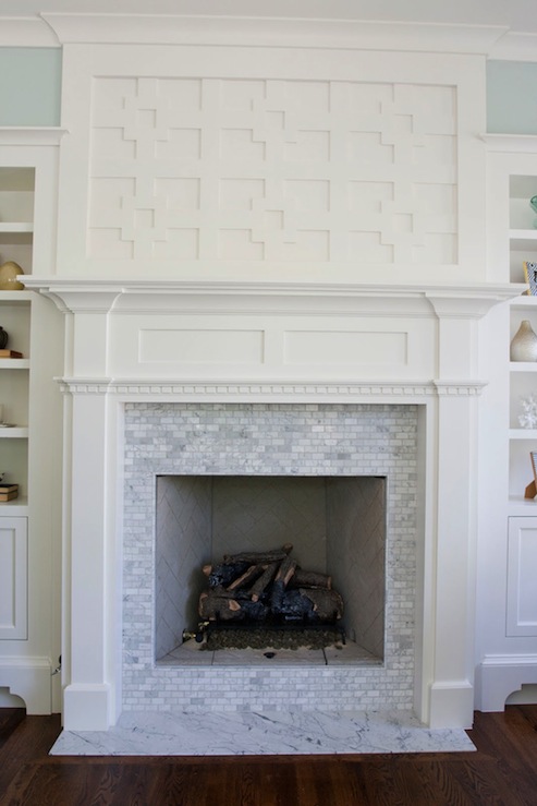 white marble tile fireplace