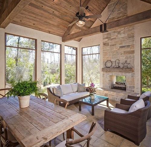 Sunroom with Fireplace Beautiful Neutral Sunroom Fire Stone Beams