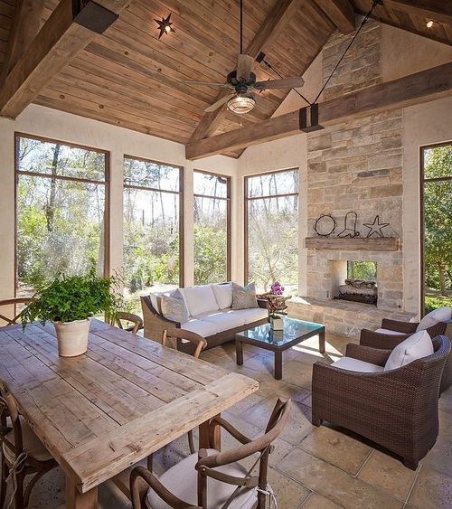 Sunroom with Fireplace Beautiful Neutral Sunroom Fire Stone Beams