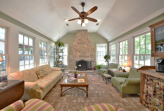 Sunroom with massive stone fireplace Lindenhof B&B Augusta sunroom with massive