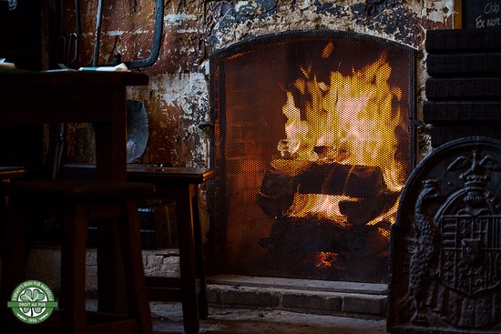 The fireplace fed with Irish peat Picture of O Brady s the fireplace fed with