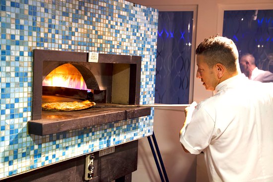 Brick oven thin crust pizza Picture of Isola Italian brick oven thin crust