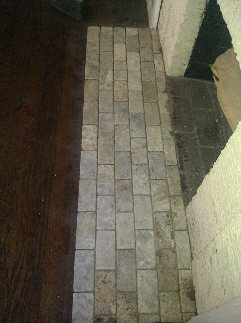 Stone tile in front of fireplace Flooring and tile 0d6d797f1487a6162ac01b82a869d69d