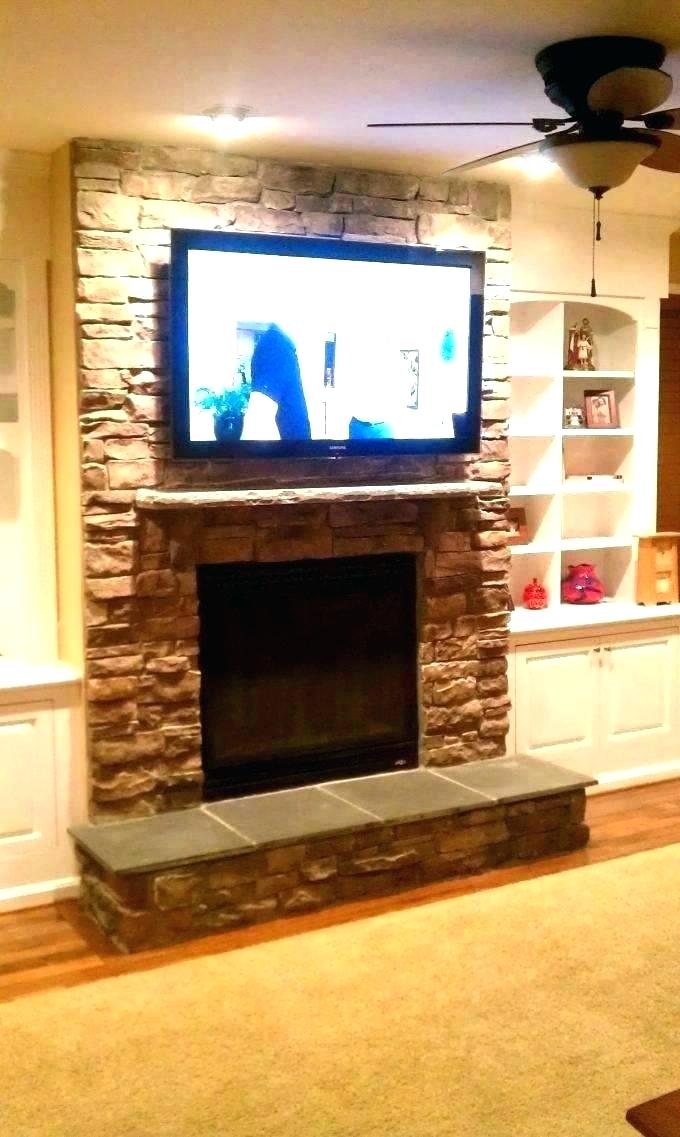 tv hidden in wall wall mount where to put cable box above fireplace hang over hidden mounted ponents tv wall mount with hidden shelf