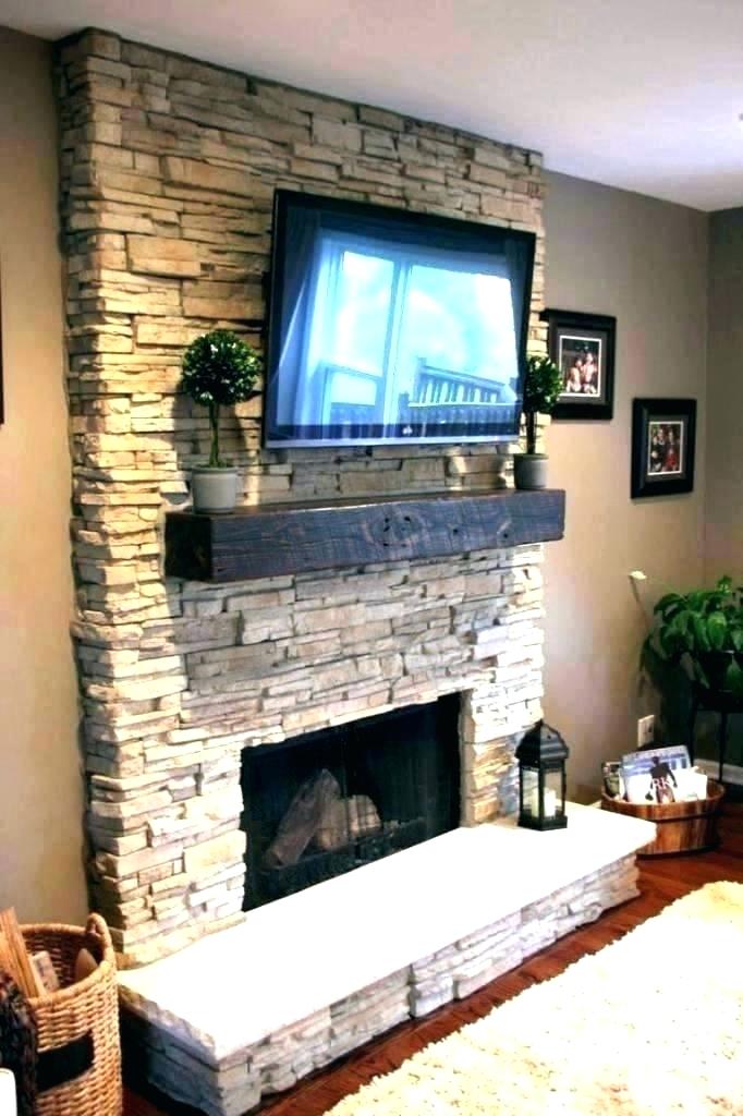 ing fireplace tv wall mount over stone